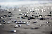 Surface Level Of Wet Pebbles At Beach
