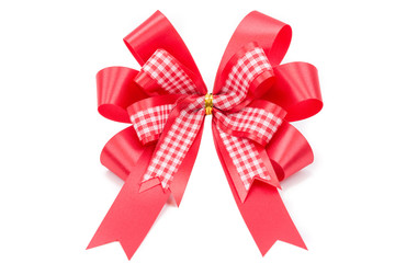 Red ribbon bow isolated on white background