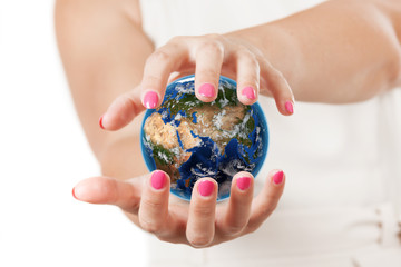 Two Woman Hands Protecting Planete Earth World Globe. Elements of this image furnished by NASA. 3d Rendering