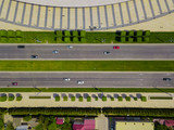 Fototapeta  - Top down aerial city view of freeway busy city road traffic jam highway.