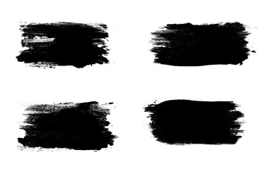 set four black strokes of paint isolated on a white background.
