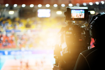 Wall Mural - Blurred background of professional volleyball league cup championship international competition live sport news tv show from indoor arena with fans crowd cheer up and watching from stand for victory