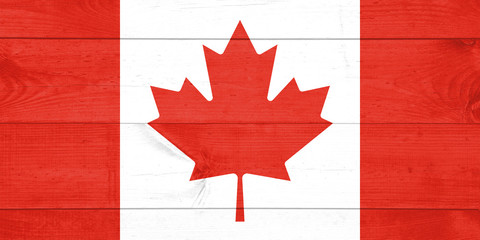 Wall Mural - canadian flag painted on old wood plank background