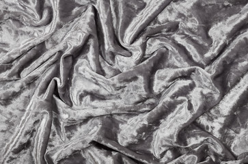  Texture of draped grey wrinkled velvet fabric