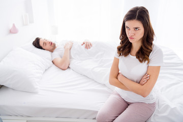 Poster - Photo of two people sad upset angry girl cross arms have evening problem argument scandal with husband he sleep nap she sit bad wear t-shirt in house indoors