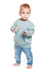 Fashionable portrait of a charming baby boy in a mint sweatshirt