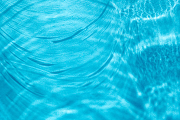 blue background with waves and round sparkles