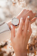 Beautiful classic silver watch on woman hand