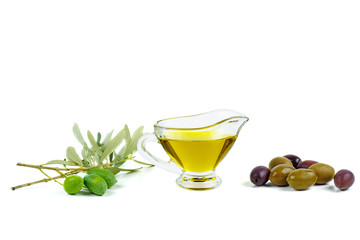 Delicious olive oil, black and green olives with leaves isolated on a white background