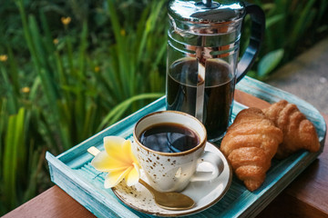 Wall Mural - Cup of coffee with croissant