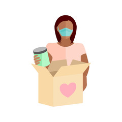 Wall Mural - Woman wearing a mask packing a box full of food items to give to those in need of help during the COVID-19 coronavirus pandemic
