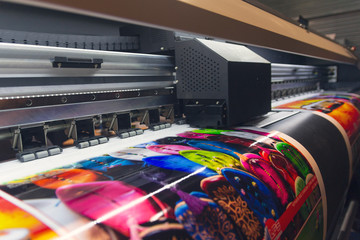 Wall Mural - large format printing machine in operation. industry