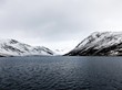 the deep waters of loch turret on a snowy day