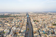 Aerial view of New Delhi public transport system crossing neighborhood, India.