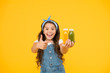 © be free - Supermarket promotion. Living healthy life. Vitamin juice. Fresh smoothie. Girl drinking orange fresh smoothie. Vegetarian concept. Smiling kid hold fruit smoothie bottles. Healthy food. Buy food