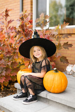 Girl In Witch Costume For Halloween