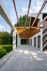 Wall Mural - Cobblestone home patio with wooden ceiling