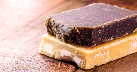 sugar cane sweets, molasses in tablets, on wooden background. consumed in Latin America, in countries like Colombia, Venezuela, Mexico, Ecuador and Guatemala.