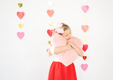 Cute Blond Girl Hugging Plush Pink Heart Valentine's Day