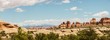 panorama of red rocks in the Canyonlands on a sunny day