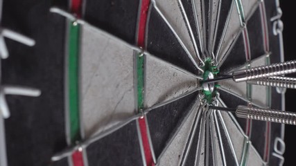 Wall Mural - Throw three dart arrows at the dartboard.