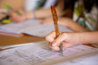 © chee siong teh - girl doing her school work