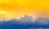 Fototapeta Na sufit - bright yellow sun light on sky with dim blue cloudy