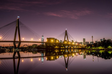 Wall Mural - bridge and cityscape at dawn