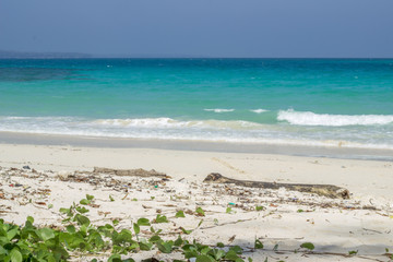 A shot of clean white sandy beach with Indian Ocean and horizon