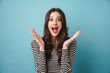 © Drobot Dean - Photo of excited nice woman expressing surprise at camera
