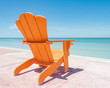 Orange Adirondack Chair with tropical view 