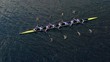Rowing Sport Team in Slow Motion while Regatta Competition shot with Aerial Drone