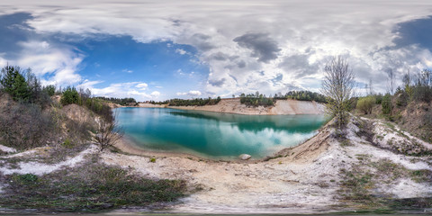 Wall Mural - full seamless spherical hdri panorama 360 degrees angle view on limestone coast of huge green lake for sand extraction old mining with beautiful clouds in equirectangular projection, VR content
