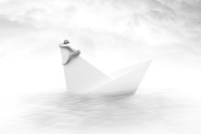 Man Clinging To A Sinking Paper Boat Surreal Concept
