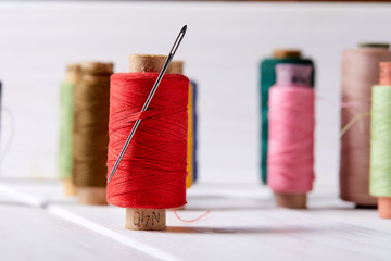 Poster - bobbins with thread and needles