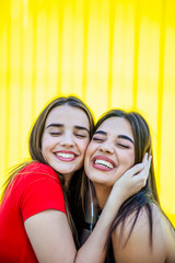 two best female friends embracing together