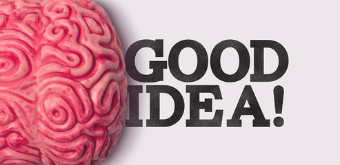 Wall Mural - Good Idea word next to a human brain model