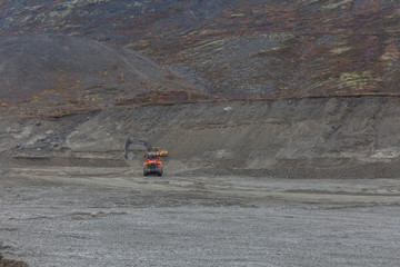 Construction machinery works on quarry mining in the Khibiny mountains, Kola Peninsula