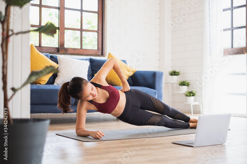 Fotografía Young Asian healthy woman workout at home, exercise, fit, doing yoga, home fitne