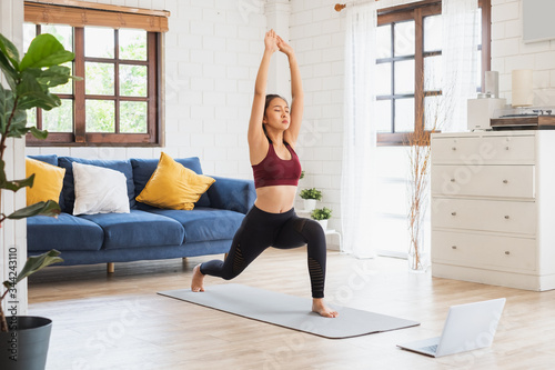 Cuadros en Lienzo Young Asian healthy woman workout at home, exercise, fit, doing yoga, home fitne