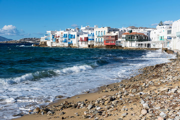 Bright scenic view of the colorful waterfront. Mykonos Town, Greece