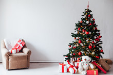Christmas Tree With Gifts Of Red White Interior Decor For The New Year