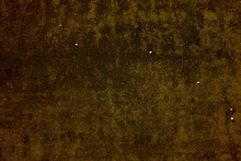 Dark Brown Background. Brown Background With Millers Stones. Brown Asphalt