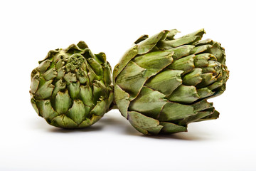 Wall Mural - Fresh artichokes isolated on a white background