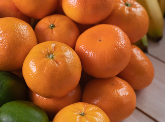 Wall Mural - Vegan eating concept tangerine in blue plate 100% Healthy.