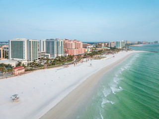 Clearwater Beach Florida. Coast or shore line Gulf of Mexico. Summer vacation. Beautiful color of ocean water. White quartz sand.