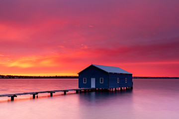 Sunrise at the boathouse on the river