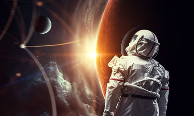 Wall Mural - spaceman and planets abstract theme