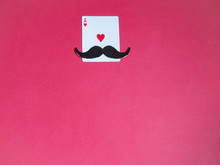 High Angle View Of Cards With Mustache On Pink Background