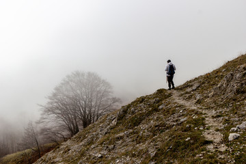 hiker on the top of a mountain